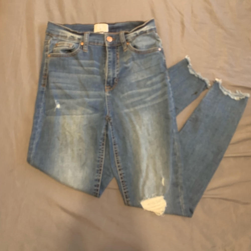 Blue jeans with rips